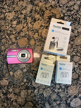 Olympus Pink Digital Compact Camera with Kastar Batteries & Charger